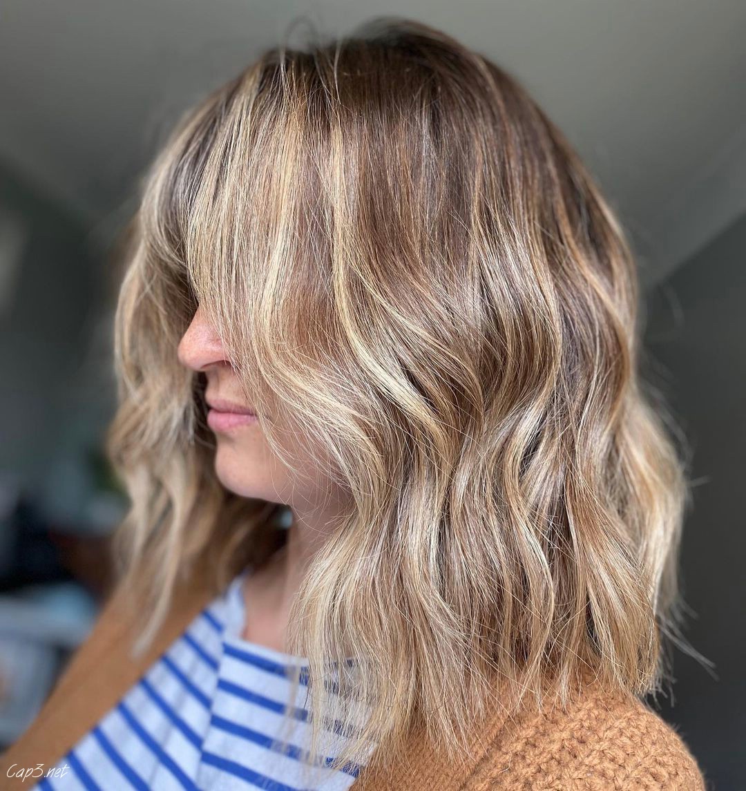 Blonde Shaggy Haircut For Oval Faces