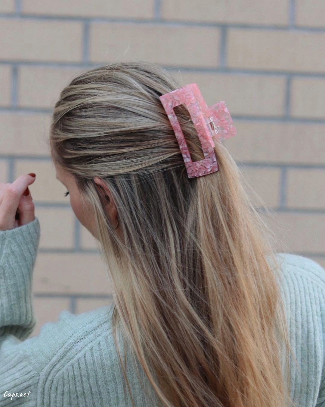 Light Blonde Hair With Pink Claw Clip