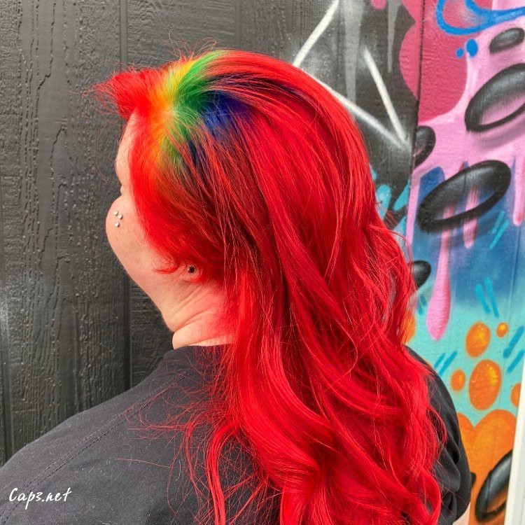 Red hair with a pop of rainbow
