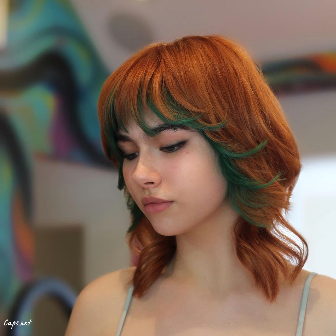 Hot Orange Wolf Haircut With Green Pop