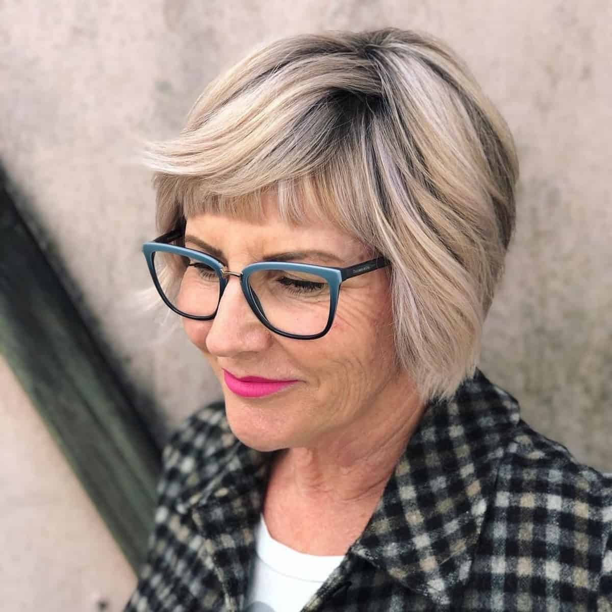 grandma inspired short bob for women aged 60 with glasses
