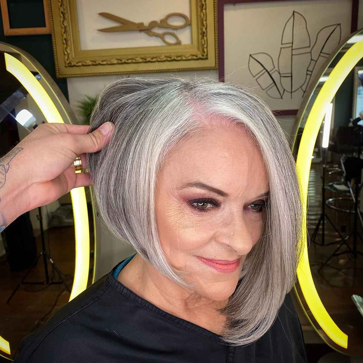 grey asymmetrical bob for women 60 and over with thin hair