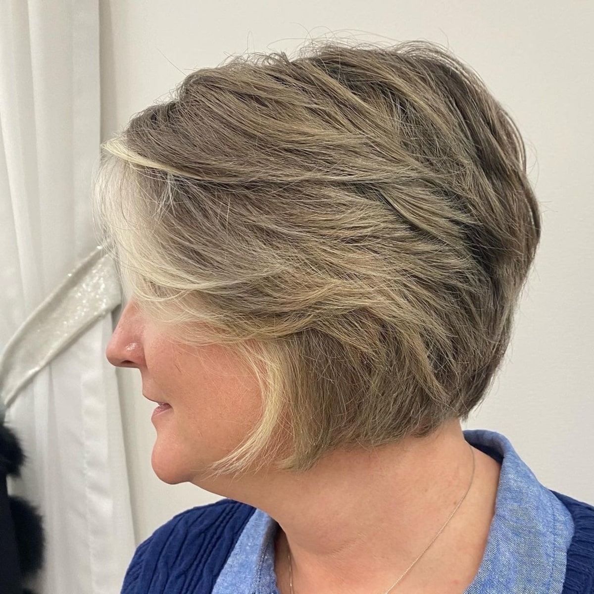 feathered pixie bob for women over 60 with fine hair