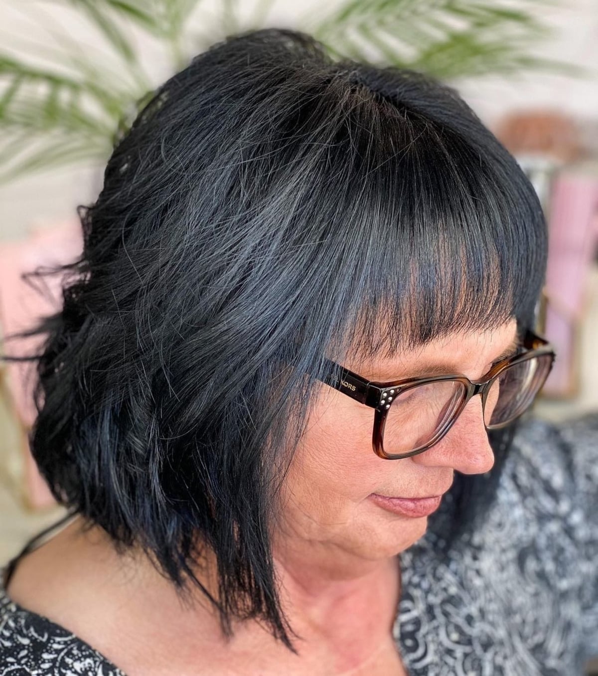 layered bob for 60 year old women with glasses