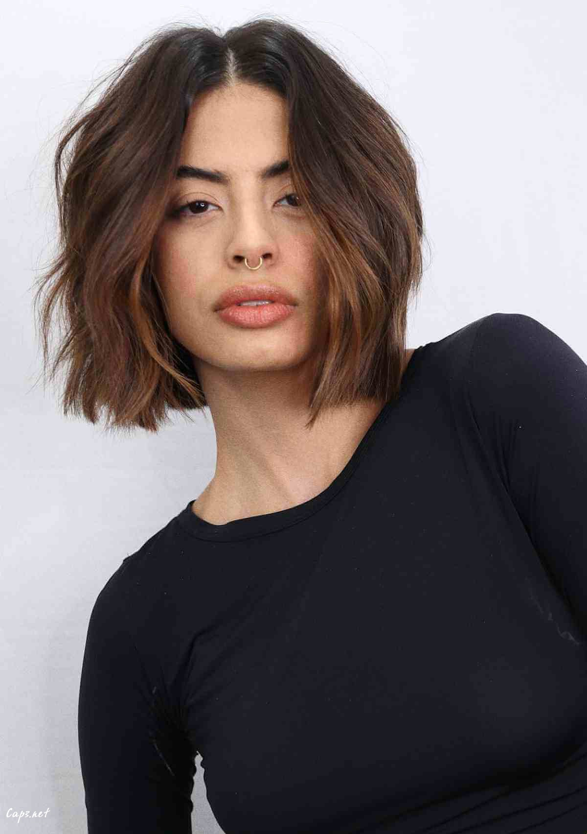 neck length bob with messy wavy style