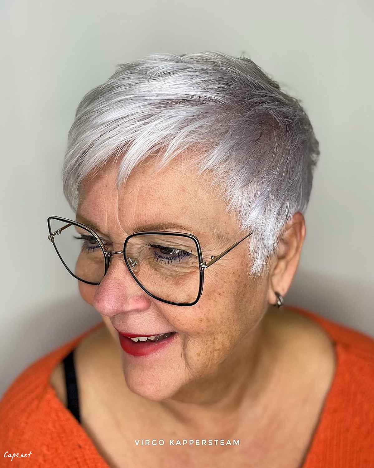 soft grey pixie with wispy bangs for ladies past sixty