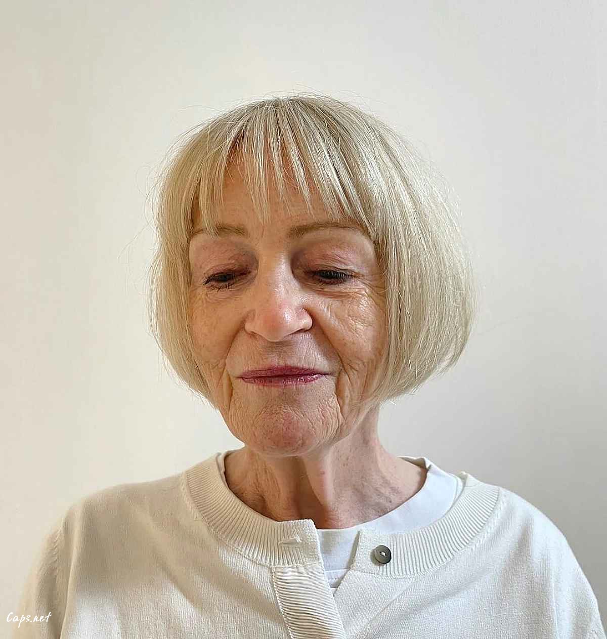 a jaw length french bob for women turning 60