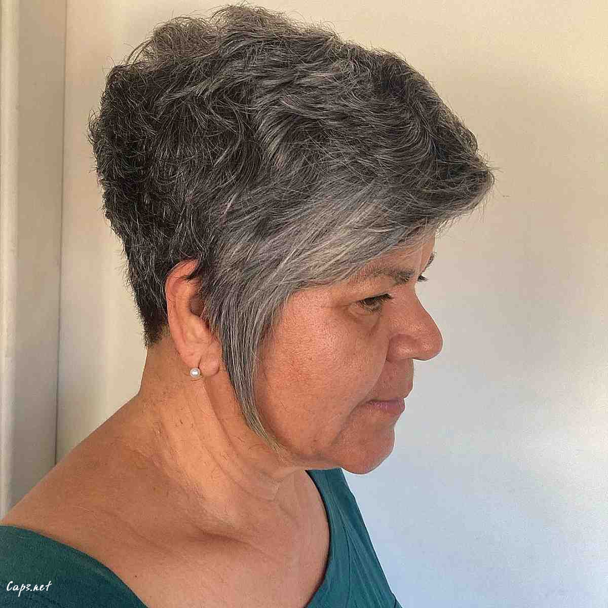 edgy silver pixie cut with long sideburns