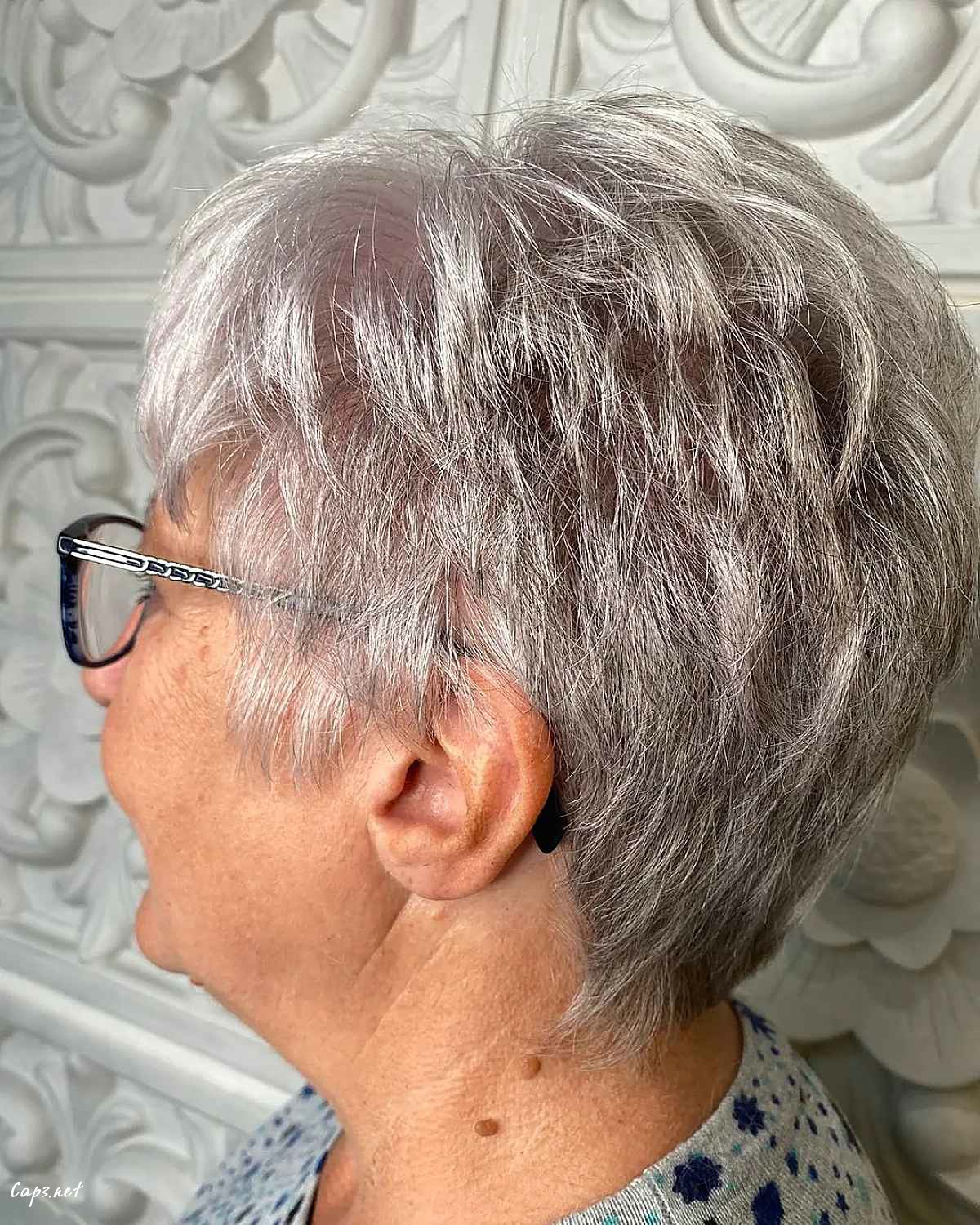 modern pixie for women over 60 with glasses