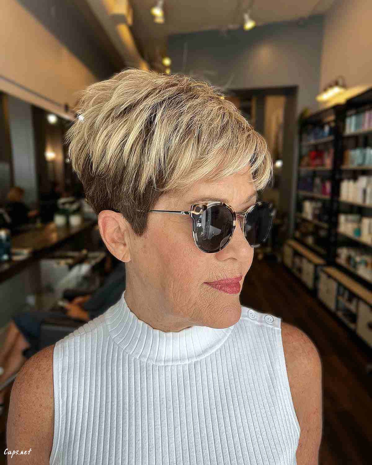 short layered crop cut for women over 60 with glasses
