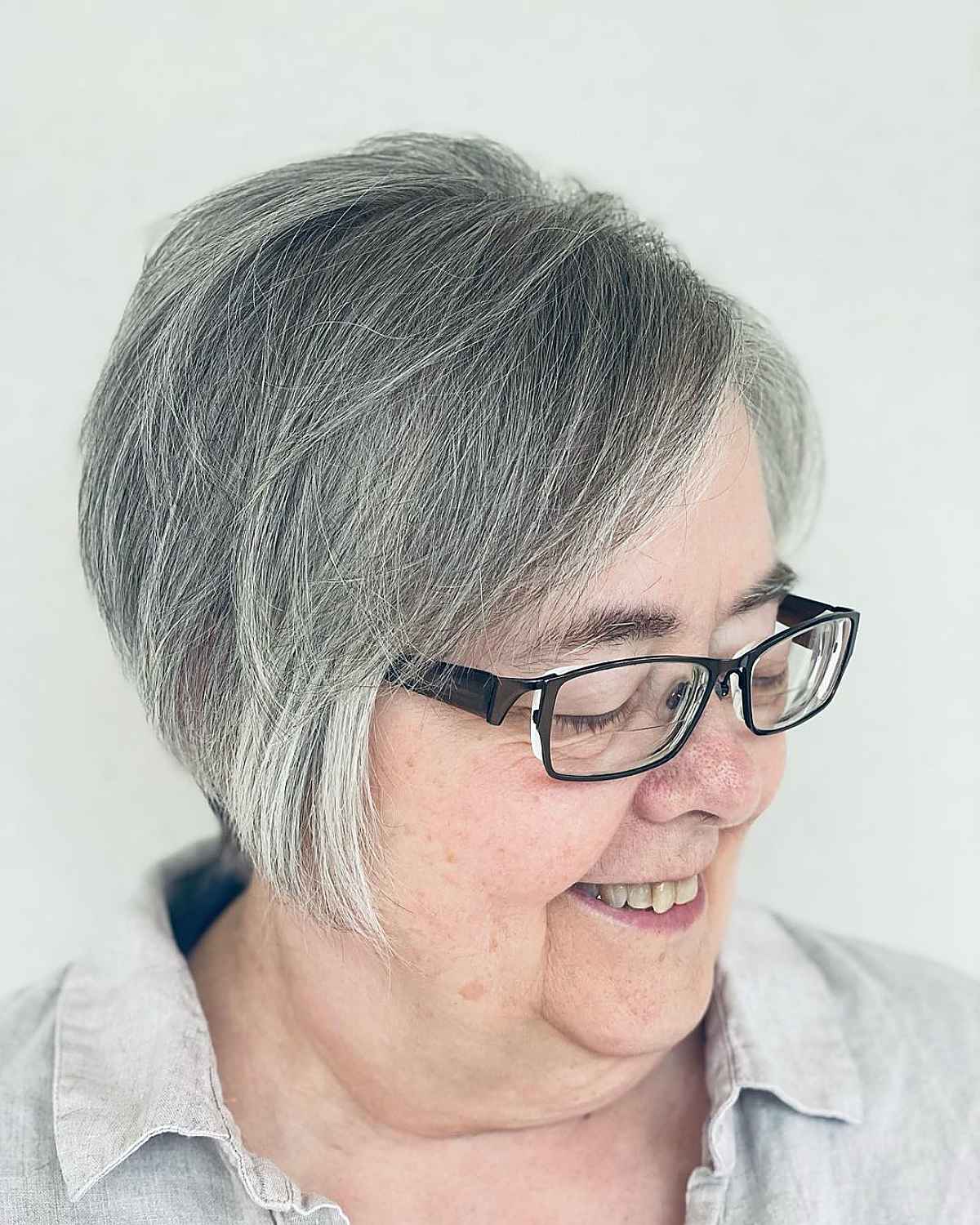 angled bob for grey hair for sixty year old women
