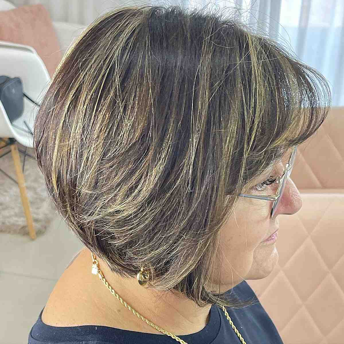 chin length bob with large frames for 60 year old woman