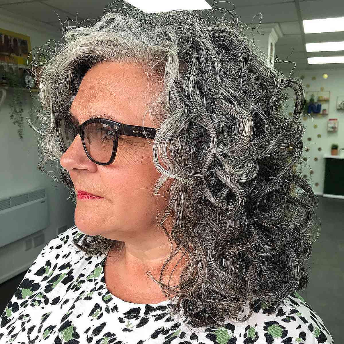 mid length gray curls for 60 year olds with glasses