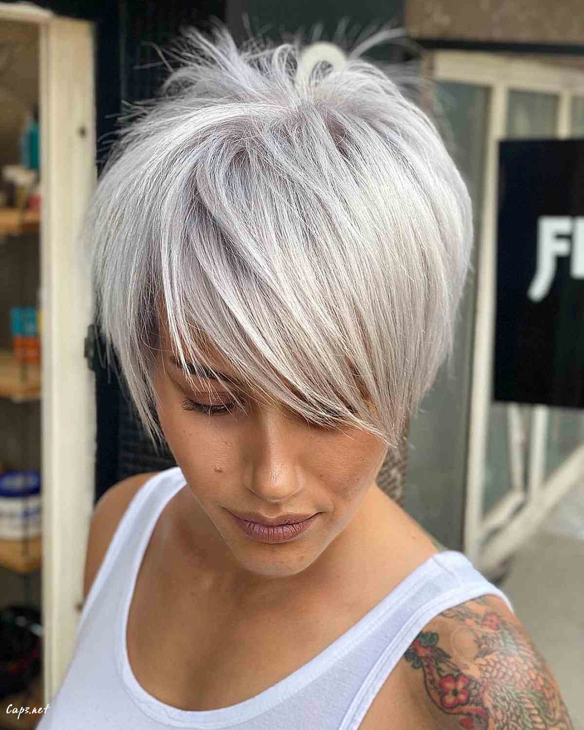 pixie cut with platinum blonde for a heart face