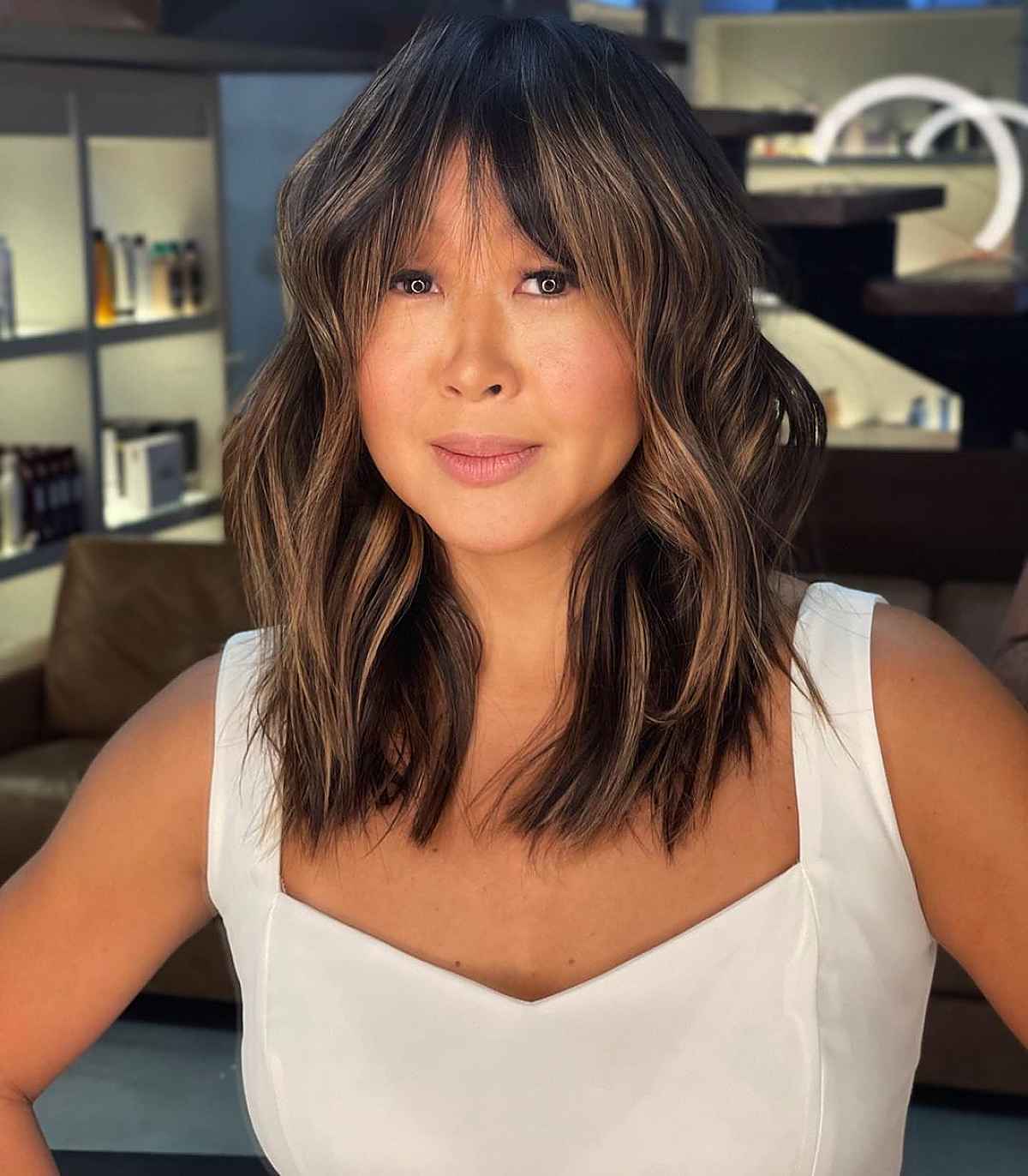 a long layered bob for round faces