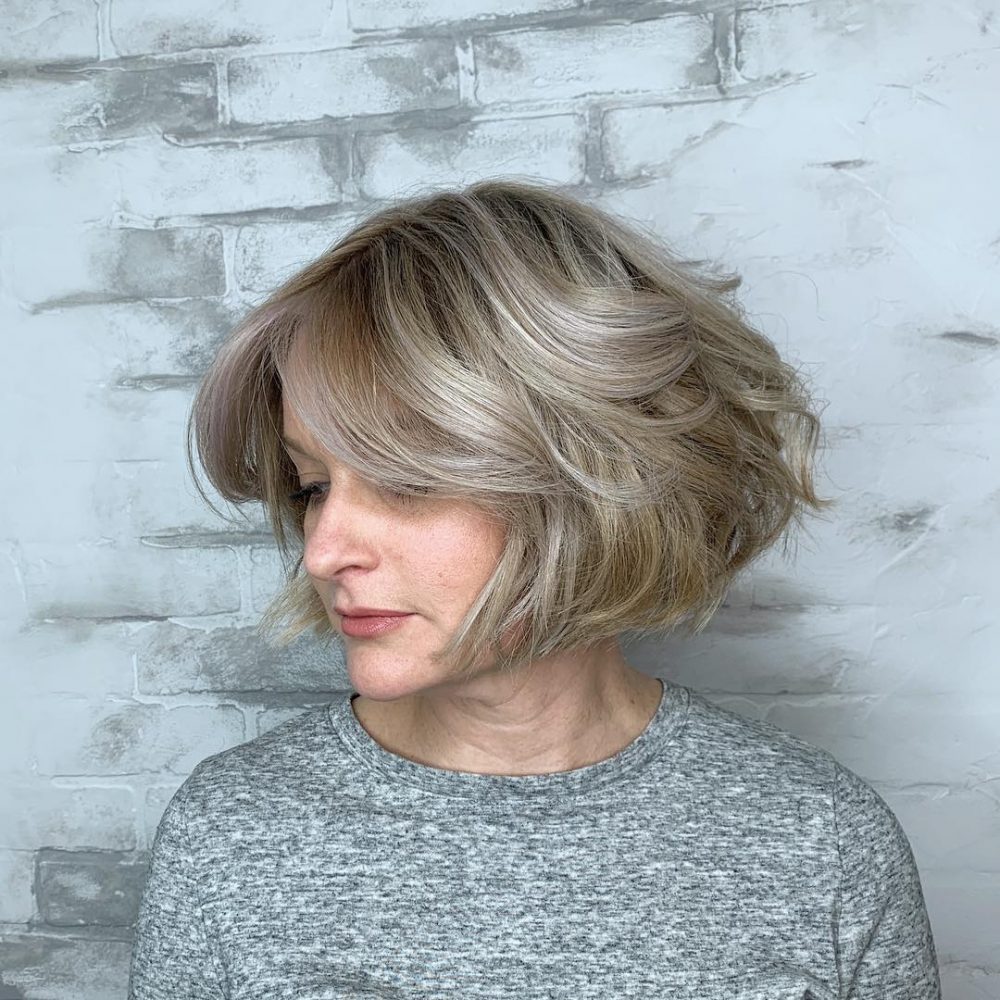 blunt bob with side swept bangs