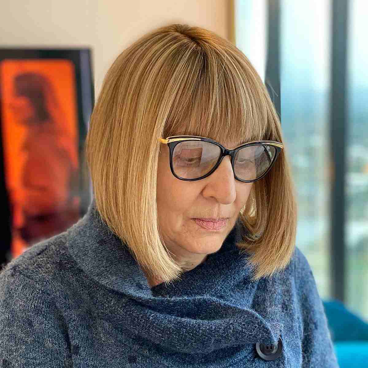 classic straight bob with textured bangs for 60 year olds