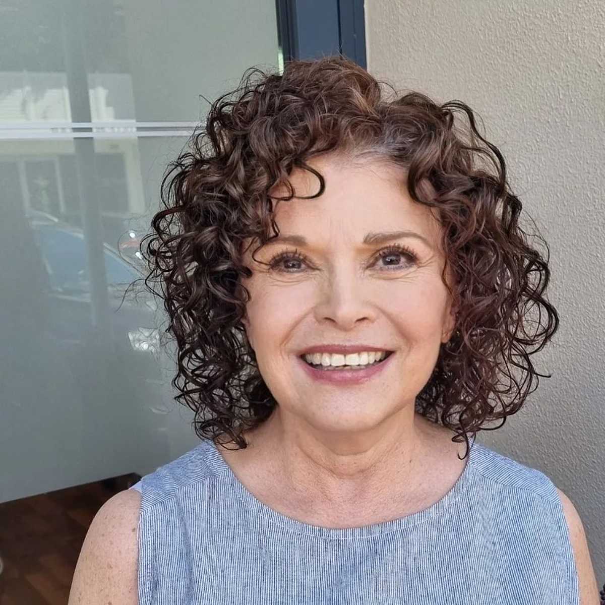 curly haircut for women over 60