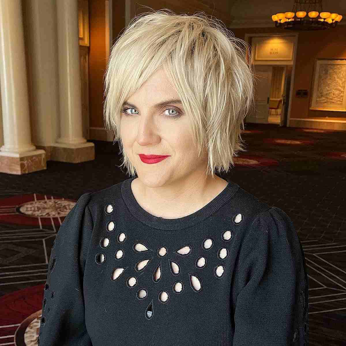 pixie bob with razored layers and bangs for women over forty