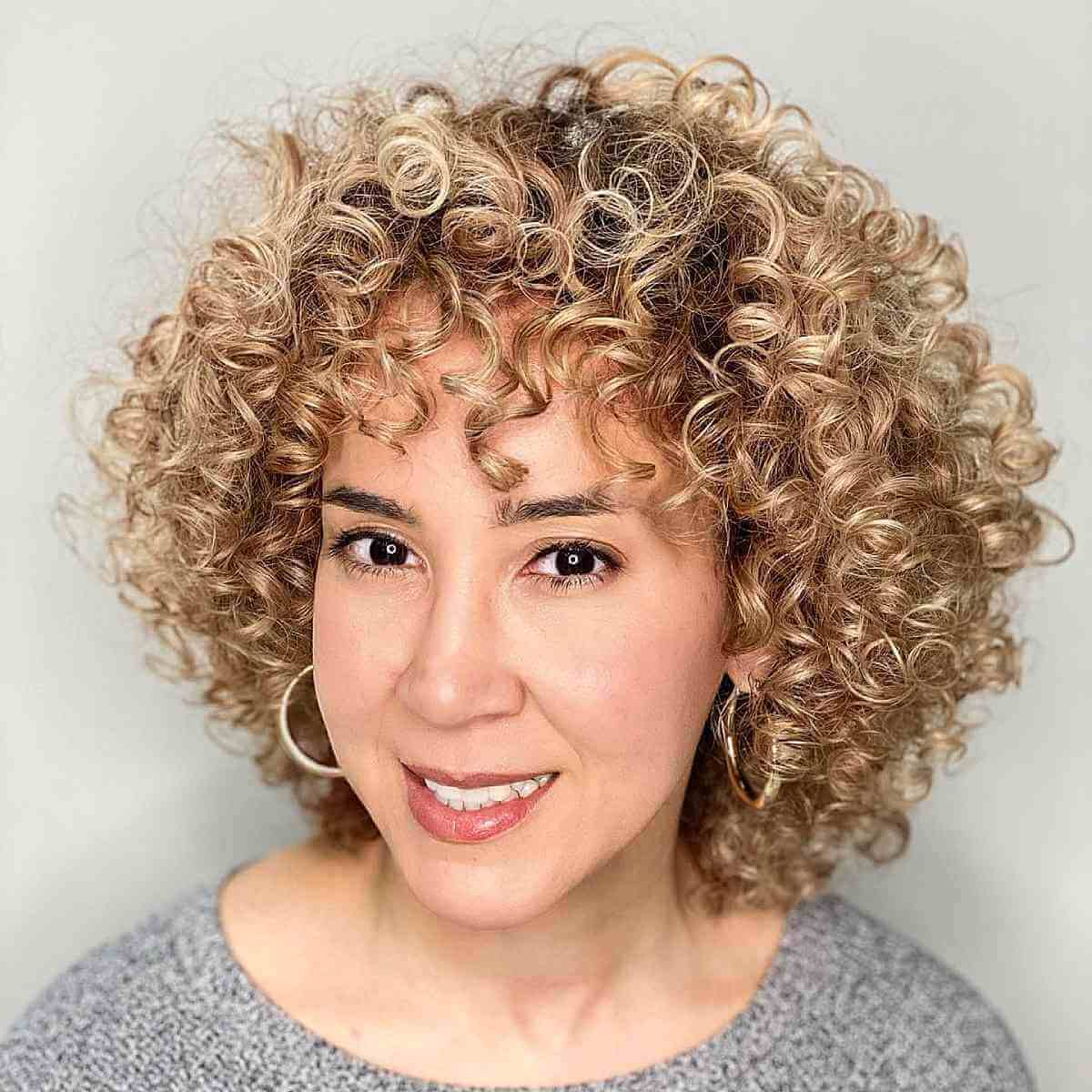 short curly hair for ladies in their 40s